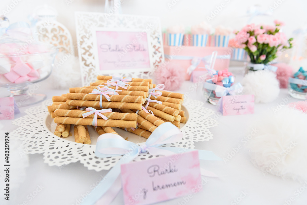 Tasty sweets on a pastel candy bar Tasty sweets on a pastel candy bar