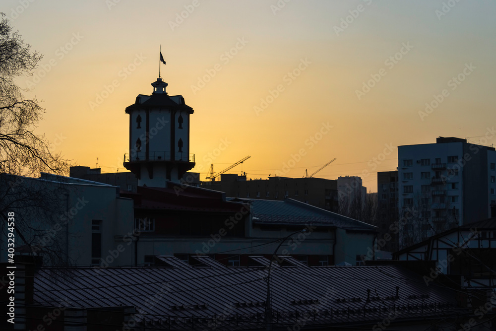 Sunset over the city. Sunset over the water tower and city view.