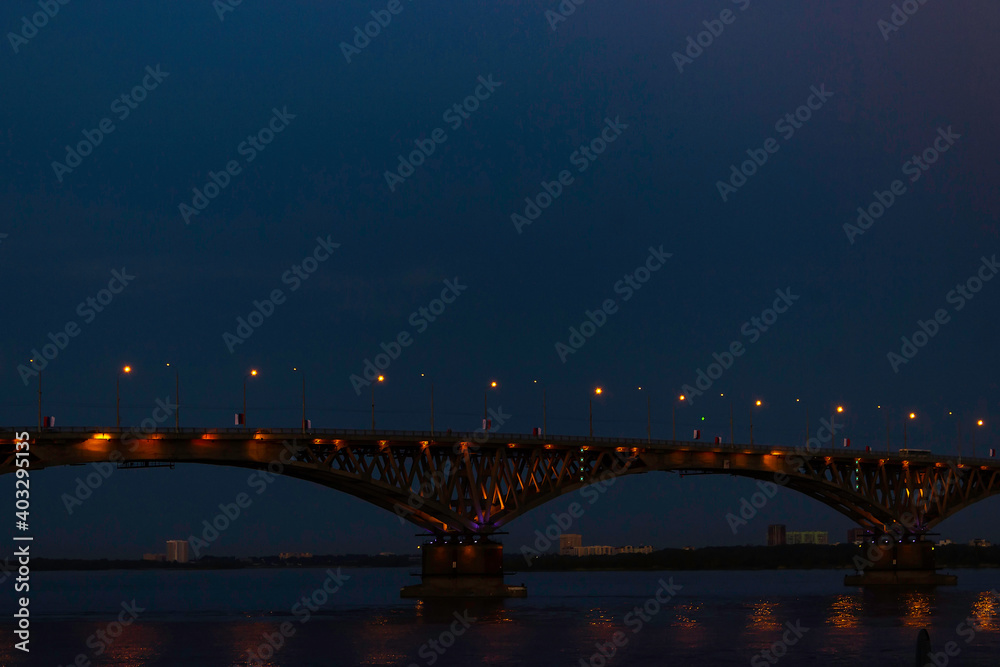 Bridge over the Volga river in the city of Saratov at night.