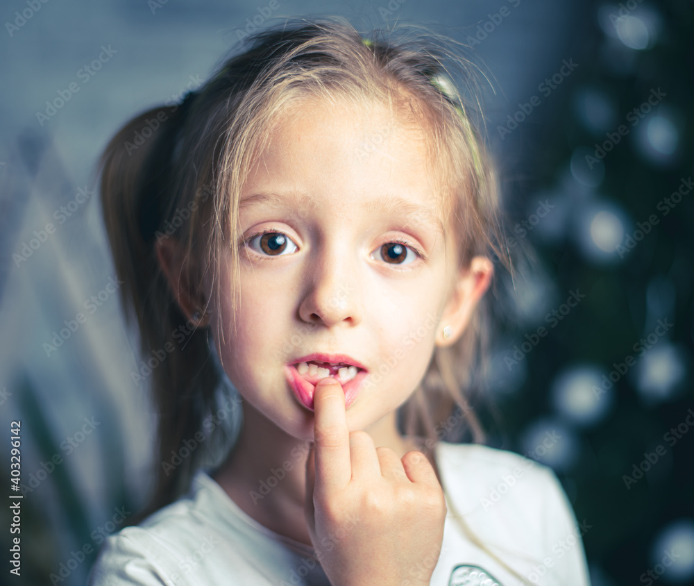image of a little beautiful girl who lost a tooth image of a little beautiful girl who lost a tooth