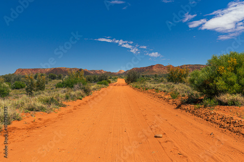 Sandy  unpaved road in the outback in Australia