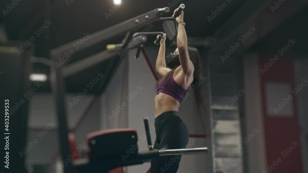 Girl with protective mask in gym Girl with protective mask in gym