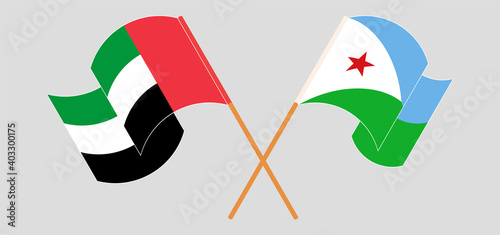 Crossed and waving flags of the United Arab Emirates and Djibouti