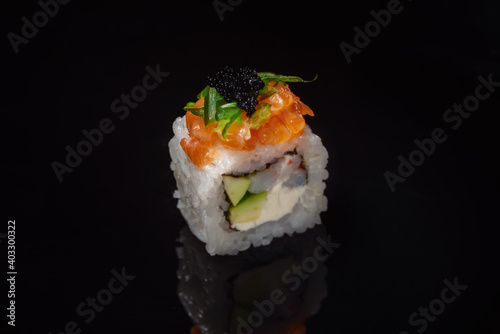 roll with avocado, caviare and rice