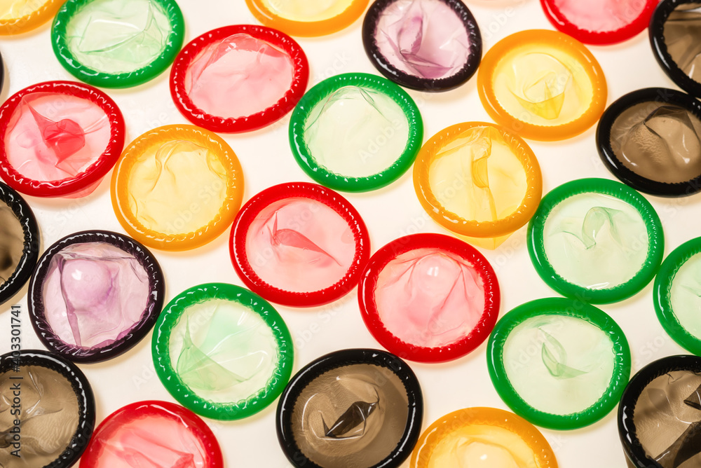 Colorful condoms background.
