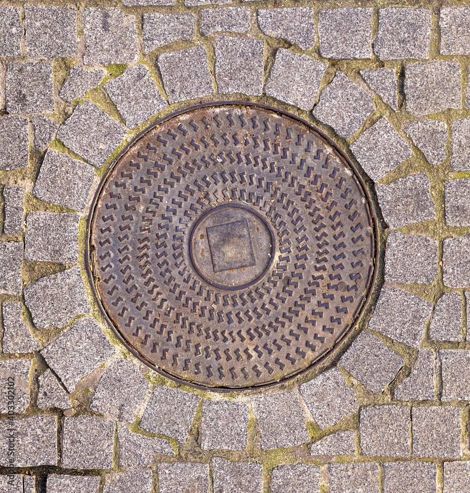 Rusty manhole cap, grunge manhole cover, round. 