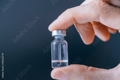 close up. ampoule with medicine in the doctor's hand .