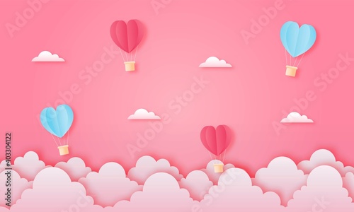 paper cut happy valentine's day concept. landscape with cloud and heart shape hot air balloons flying on pink sky background paper art style. vector illustration. 