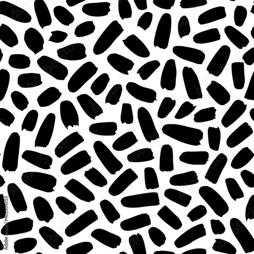 Brush strokes vector seamless pattern. Black paint freehand scribbles  small lines  dry brush stroke texture. Chaotic rough smears. Black and white mosaic texture. Hand drawn grunge ink illustration.