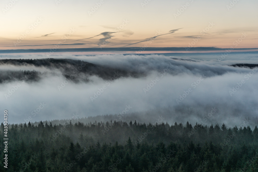 Bohemian mountains covered by a morning haze