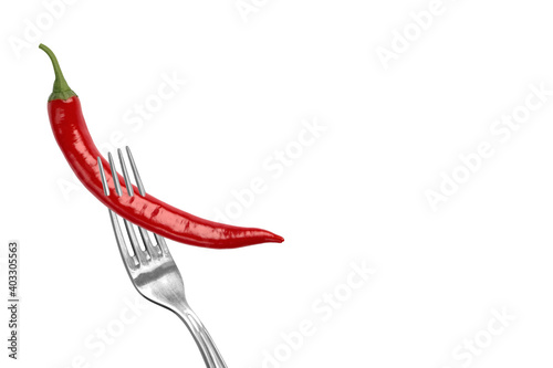 Isolated chili pepper on a white background. Impaled on a fork. Red, hot. Capsicum. Seasoning. Spice. Mexican. Element for the design. © Valentina Shilkina