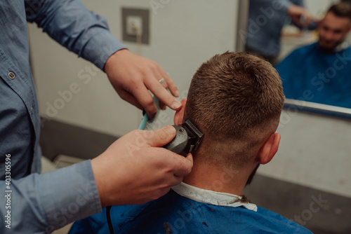 Hipster client visiting barber shop 
