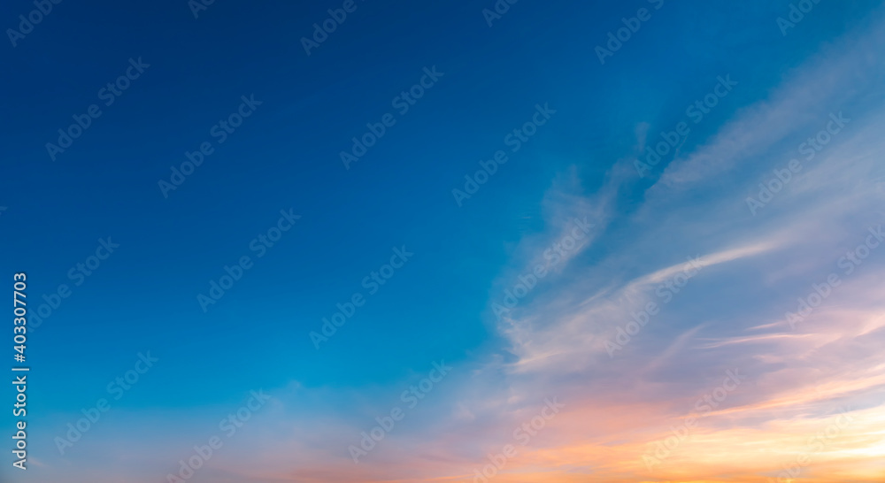 Beautiful colorful bright sunset sky with orange clouds. Nature sky background.