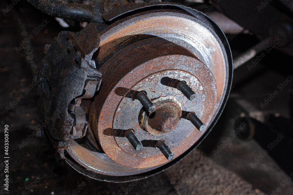 rusty car brake disc, brake repair concept rusty car brake disc, brake repair concept