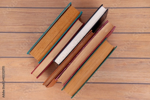 Books on wooden background. 