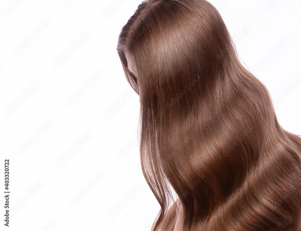Portrait of beautiful brown-haired woman with a perfectly curls hair, and classic make-up. Portrait of beautiful brown-haired woman with a perfectly curls hair, and classic make-up.
