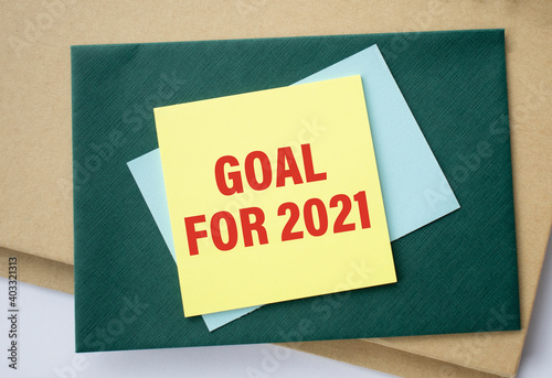 planner of goals and plans for 2021, a sheet of paper with the inscription buy a house from to do list, planning concept
