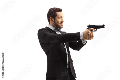 Secret agent aiming with a gun