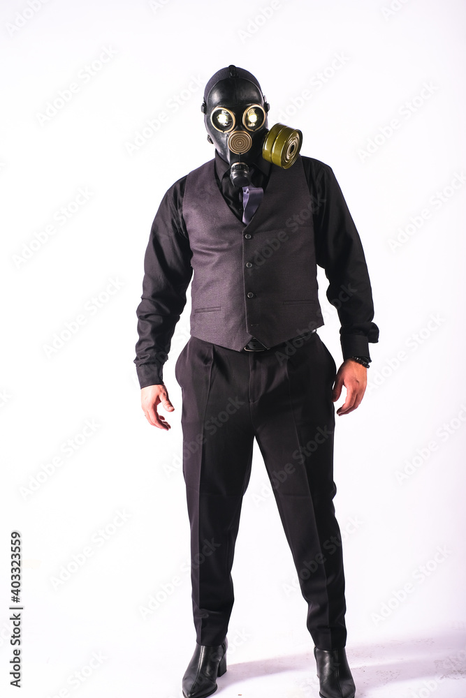 cosplay of a guy in a gas mask on a white background with glowing eyes