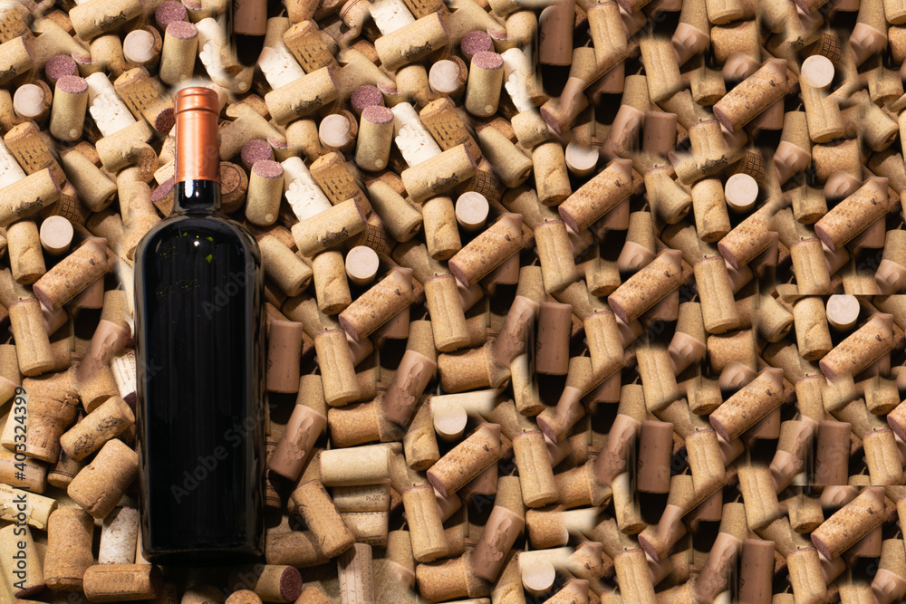 Bottle of red wine on corks