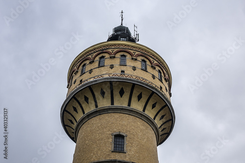 Wilhelminian water tower in Selestat. In 1887 genesis of Selestat drinking water network. Water tower is still in operation today. Place du General de Gaulle, Selestat, Alsace, France, Europe. photo