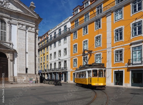 Colorful houses build the cityscape of Lisbon in Portugal with a traml