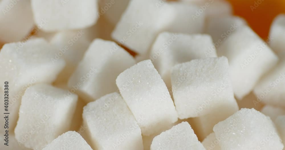 The white sugar cubes rotate slowly. The white sugar cubes rotate slowly.