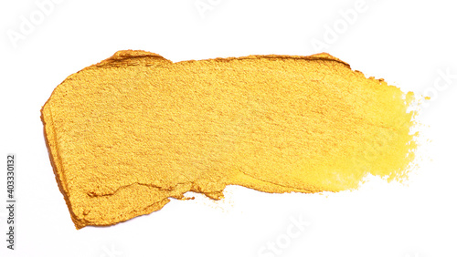 Swatch of Gold Paint on a White Background