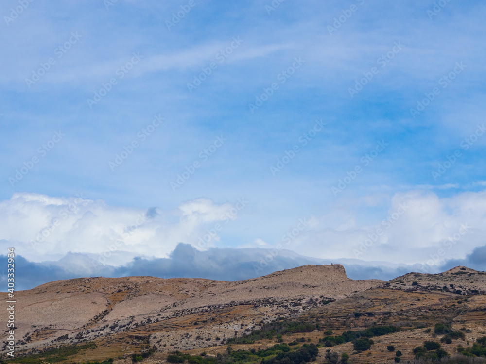 Blue sky over the hills.