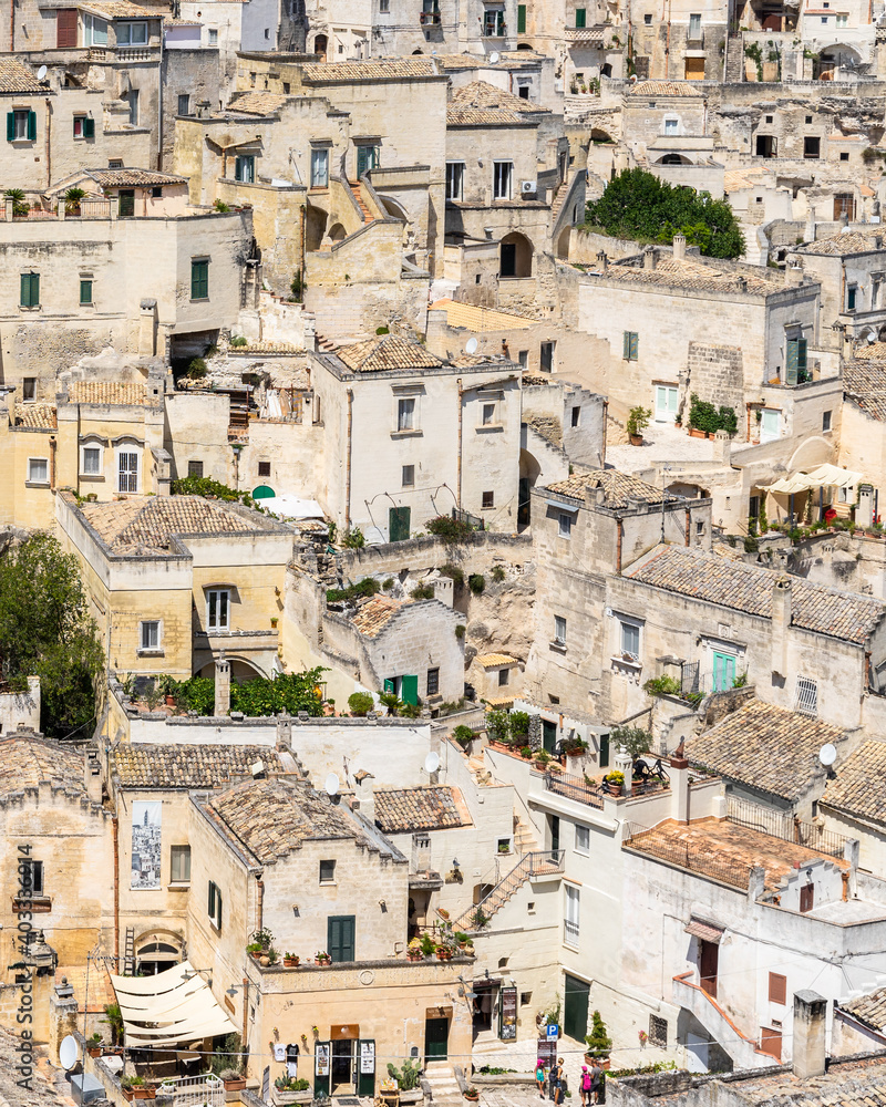 Vertical image of ancient typical houses in Matera old town (Sassi district), Basilicata, Italy