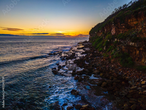 Soft blue aerial sunrise seascape