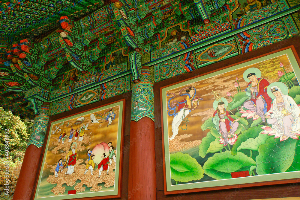 Colorful murals and intricately painted eaves decorate buildings at Bongeunsa Buddhist temple in Seoul, South Korea.