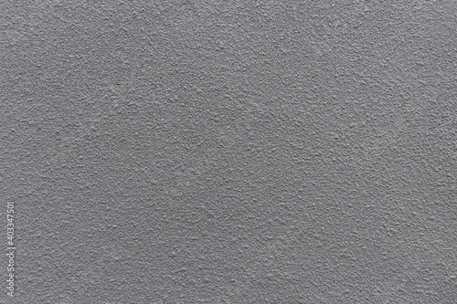 Rough gray cement plastered wall texture for background