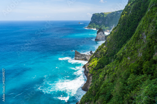 The spectacular coastline of Nusa Penida with soaring cliffs and impressive rock formations. Bali  Indonesia.