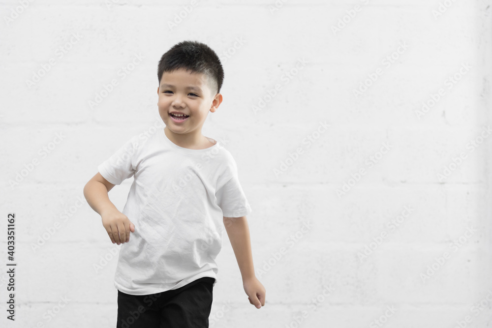 Smart little Asian boy studio portrait on background Smart little Asian boy studio portrait on background