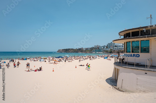 Busy Bondi Beach on a sunny day.