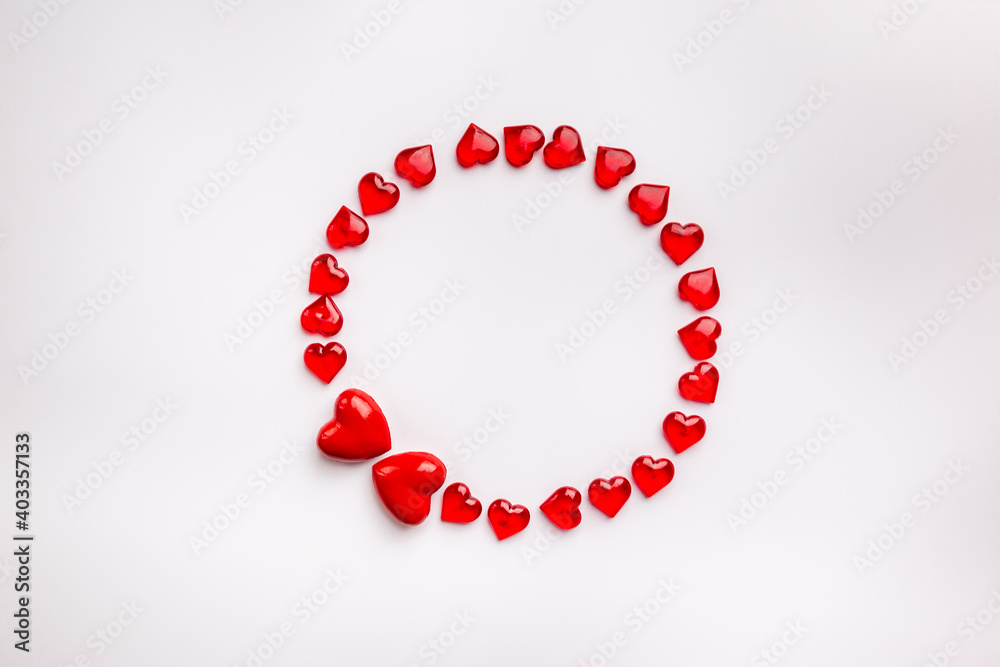 Red Hearts in circle shape on abstract white background. Love concept for valentines day. Red Hearts in circle shape on abstract white background. Love concept for valentines day.