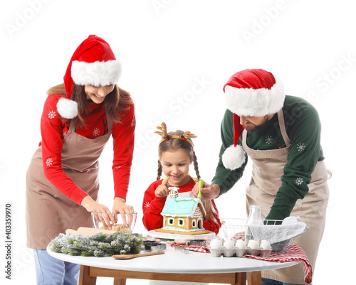 Happy family making gingerb...