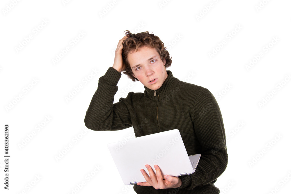 Young attractive student with laptop over white background. Young attractive student with laptop over white background.