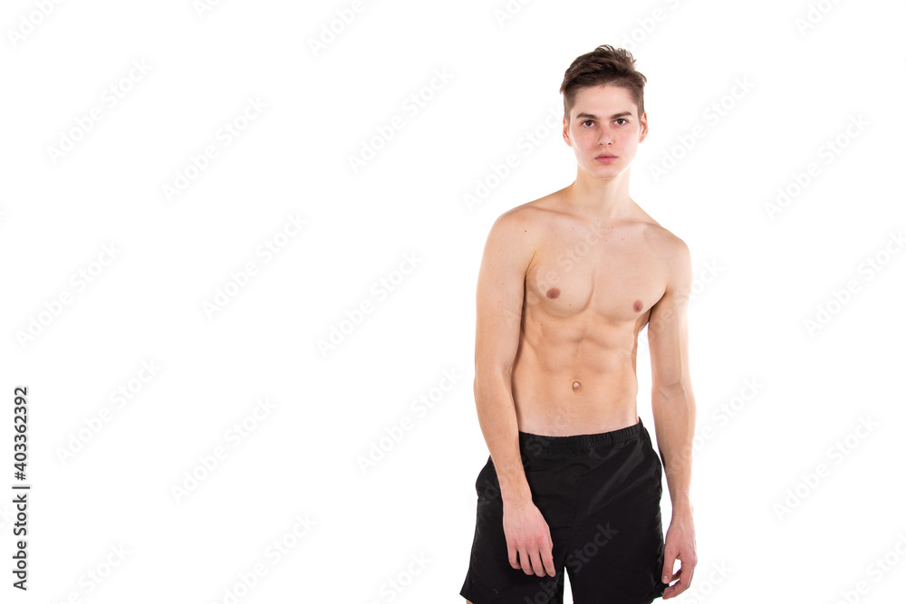 Young attractive shirtless student. White background. Young attractive shirtless student. White background.