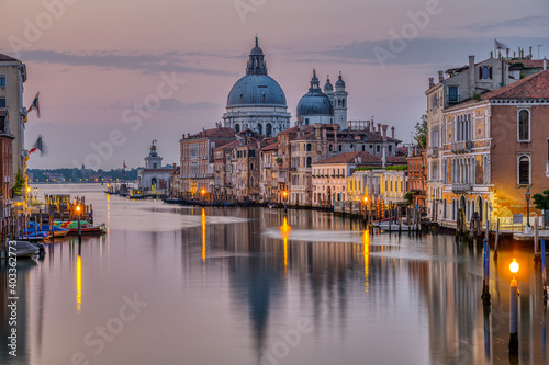 The Grand Canal and the Basilica Di Santa Maria Della Salute in Venice early in the morning © elxeneize