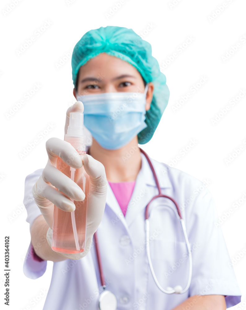 Medical physician doctor or nurse uniform wearing surgical mask holding bottle of sanitizing spray or gel Medical physician doctor or nurse uniform wearing surgical mask holding bottle of sanitizing spray or gel