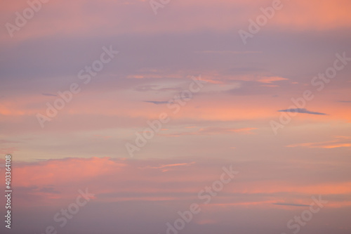 Evening sky with orange clouds. Evening sky at sunset. © Sergei