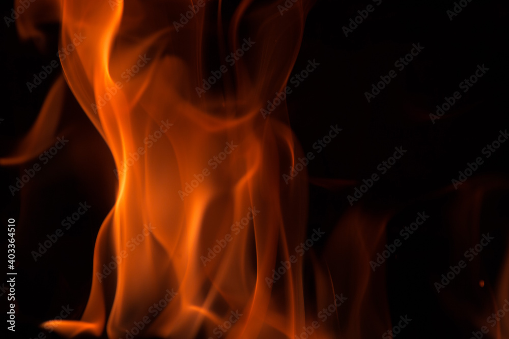 orange flames on a black background. Background image.