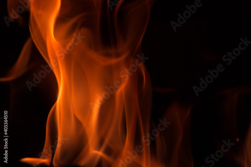 orange flames on a black background. Background image.
