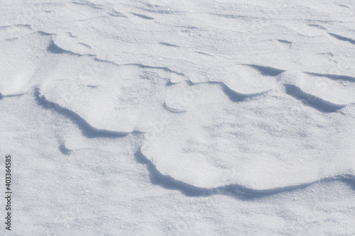 Natural patterns in the snow. Snow background.