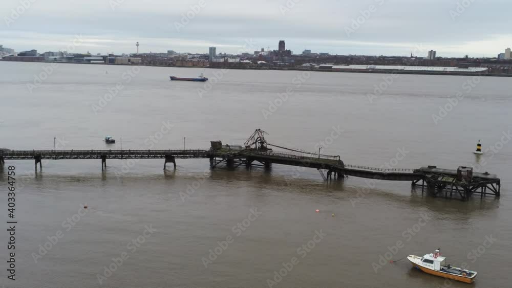 Drone view boat alongside Tranmere oil terminal Birkenhead coastal petrochemical harbour pipeline Drone view boat alongside Tranmere oil terminal Birkenhead coastal petrochemical harbour pipeline