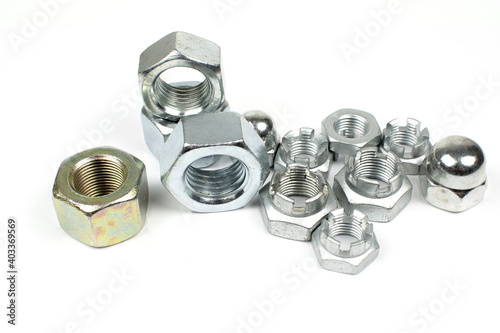 Foto metal nuts of different types on a white background