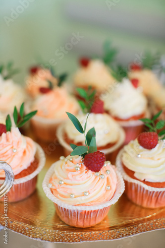 Candy bar. Sweets. Cupcakes with berries. Lollipop.
