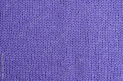 lilac knitted fabric. loops connected by spokes